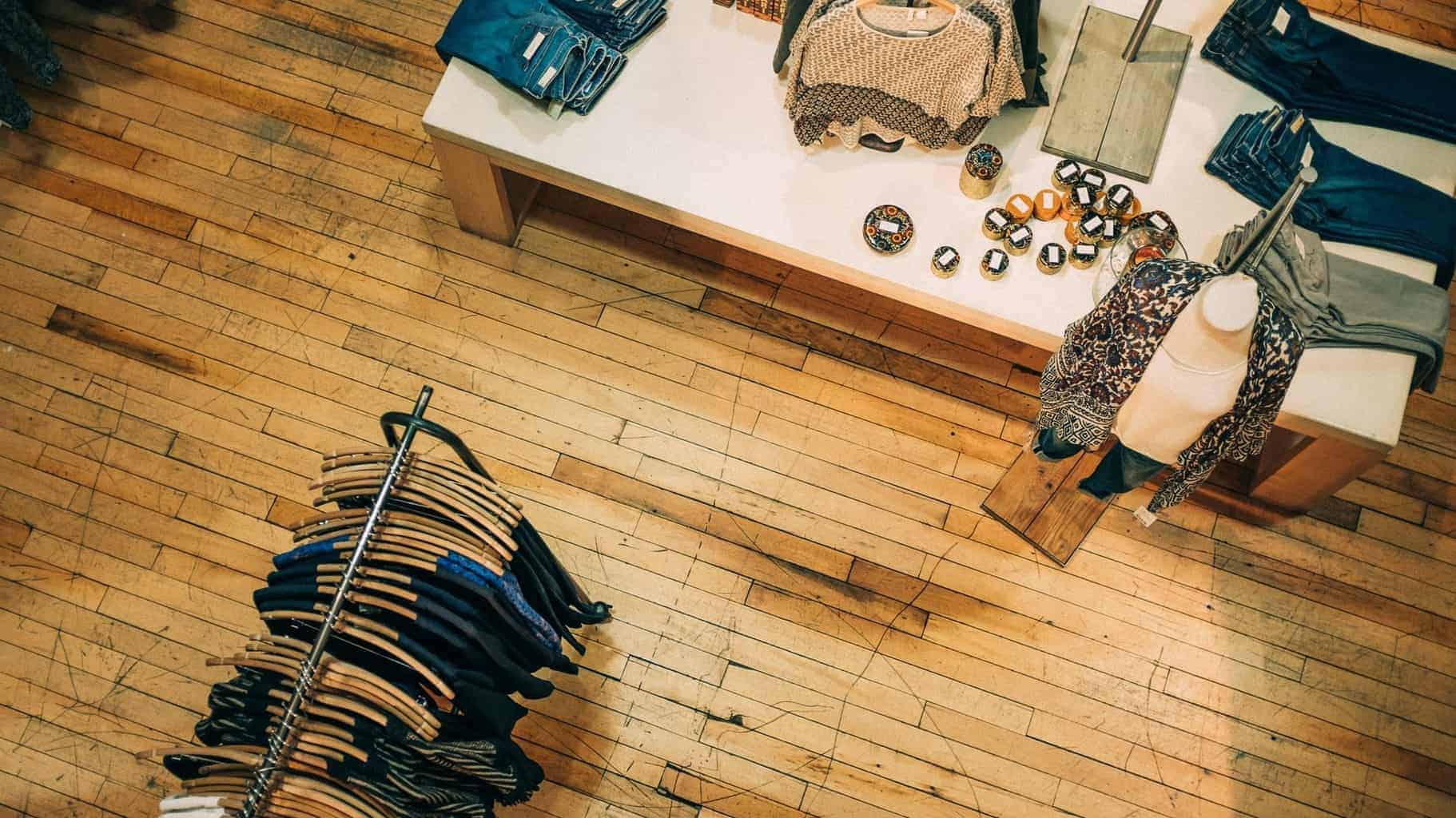 Rustic wooden flooring in a retail clothing store